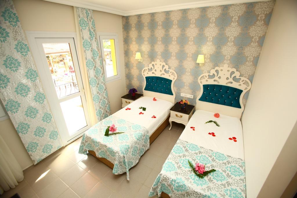 Turk Hotel Ölüdeniz Værelse billede